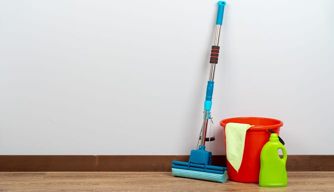 cleaning-tools-for-house-cleaning-on-wooden-floor-