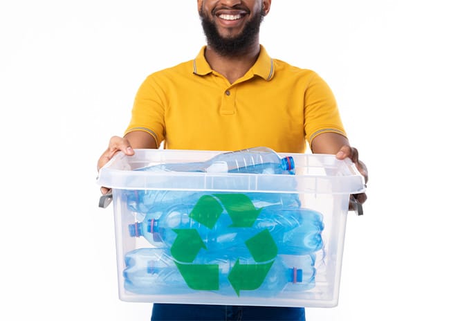 man-holding-box-with-bottles-for-disposal-and-recy-